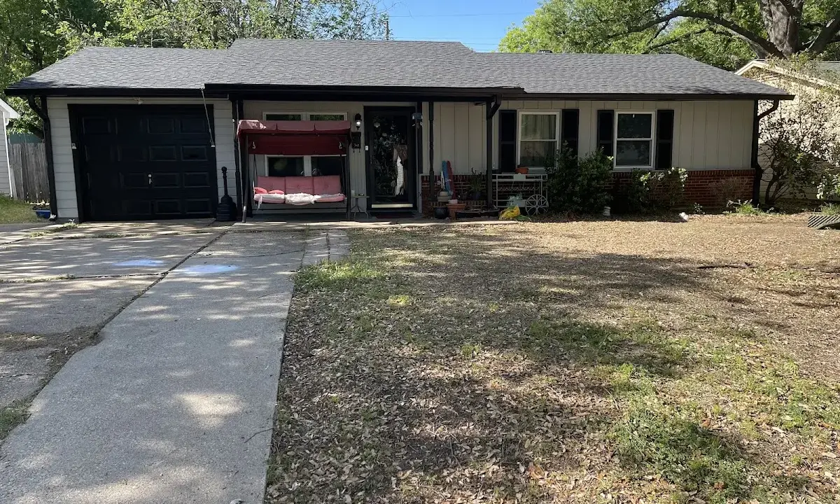 Roof Replacement crew at work on a residential roof in Friendswood